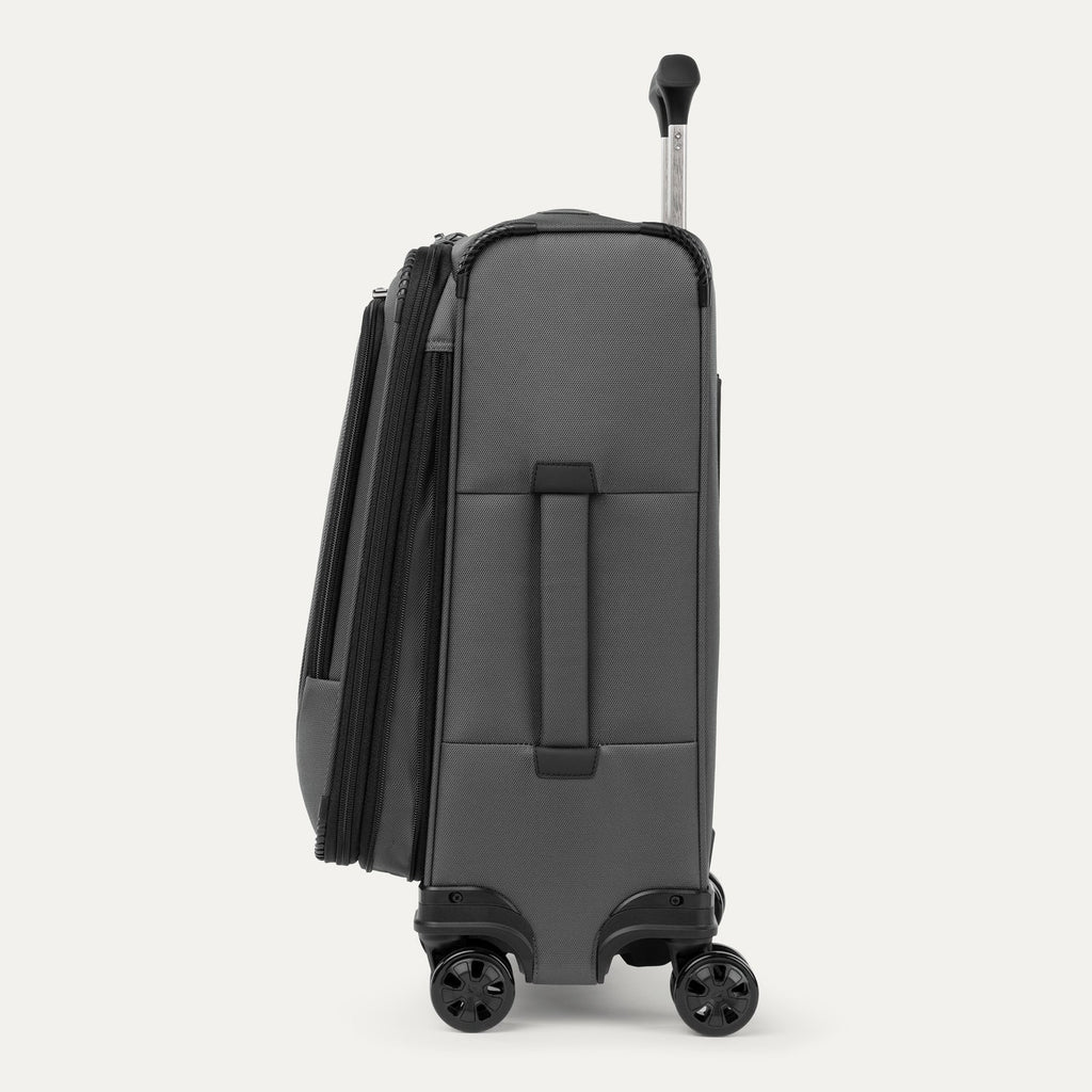 Side view of the Travelpro Crew Classic Carry-On Spinner in Titanium Grey, shown expanded with Low-Profile Side Carry Handles.
