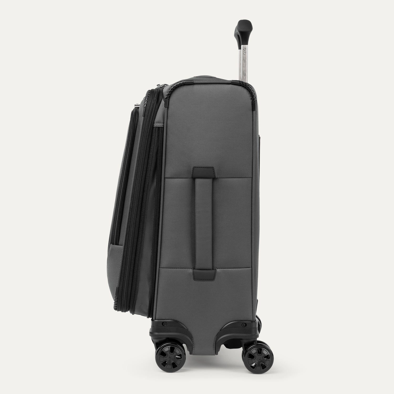 Side view of the Travelpro Crew Classic Carry-On Spinner in Titanium Grey, shown expanded with Low-Profile Side Carry Handles.
