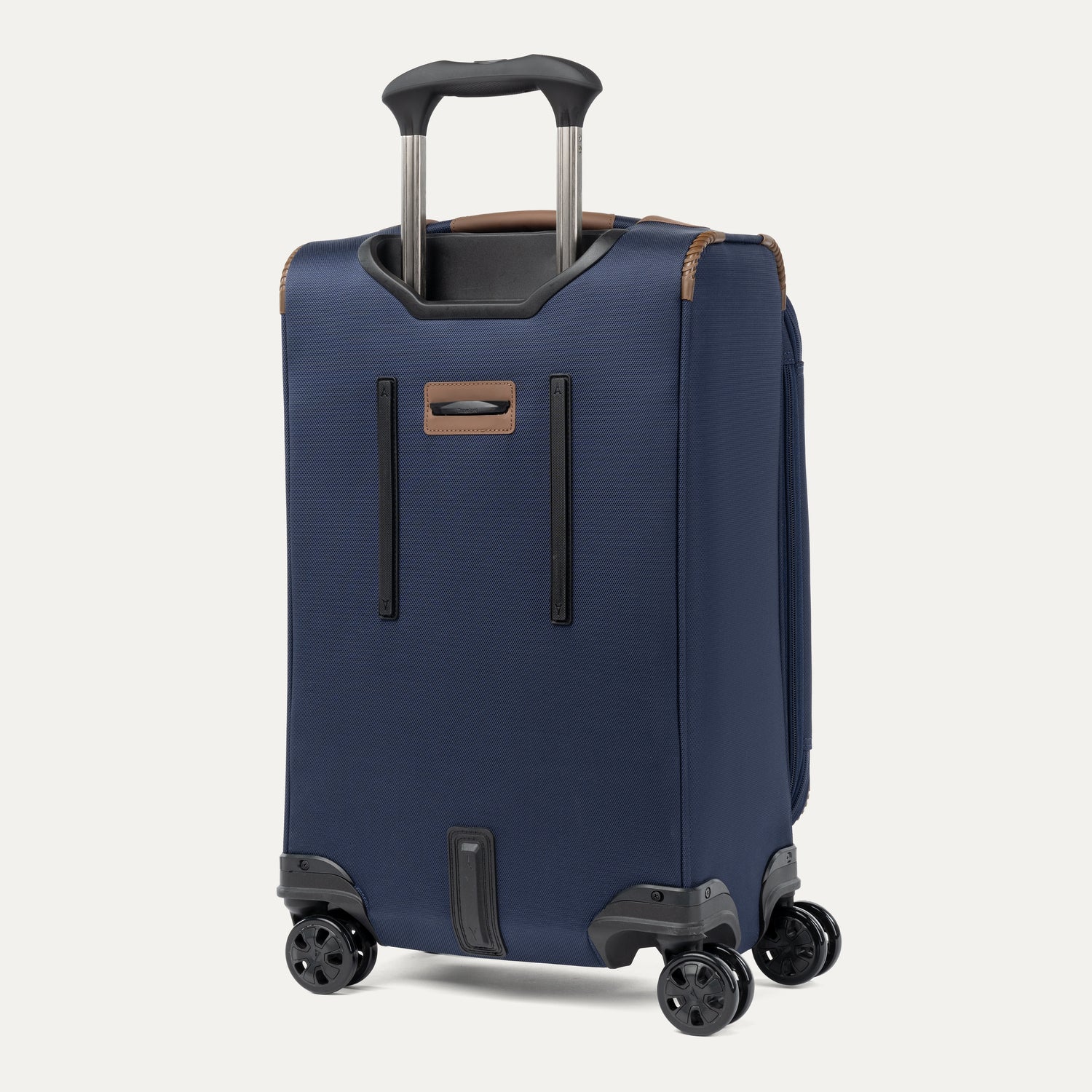 Rear view of a Travelpro Crew Classic Spinner in Patriot Blue, showing dual spinner wheels and protective corner guards.
