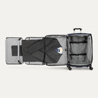Interior view of the Travelpro Crew Classic Carry-On Spinner in Patriot Blue, featuring a Suiter Packing System.
