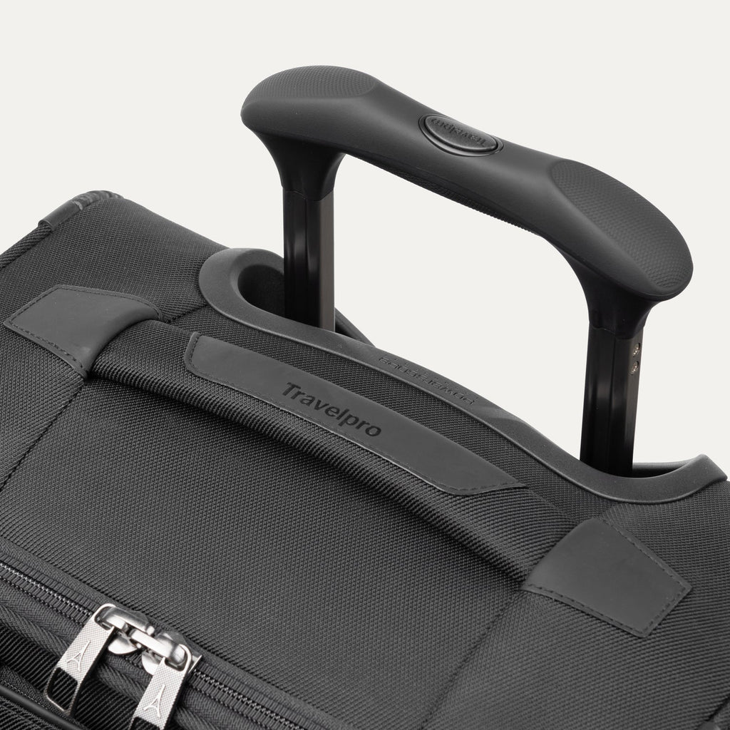 Top view of the Travelpro Crew Classic Carry-On in Black, featuring the PowerScope Extension Handle and Travelpro branding.
