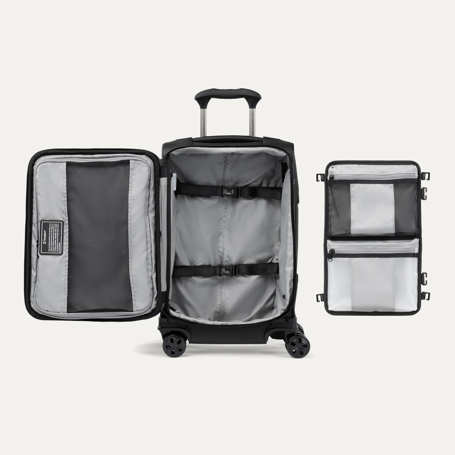 Interior view of the Travelpro Crew Classic Carry-On Spinner in Black, showing Organizational Pouches and adjustable hold-down straps.
