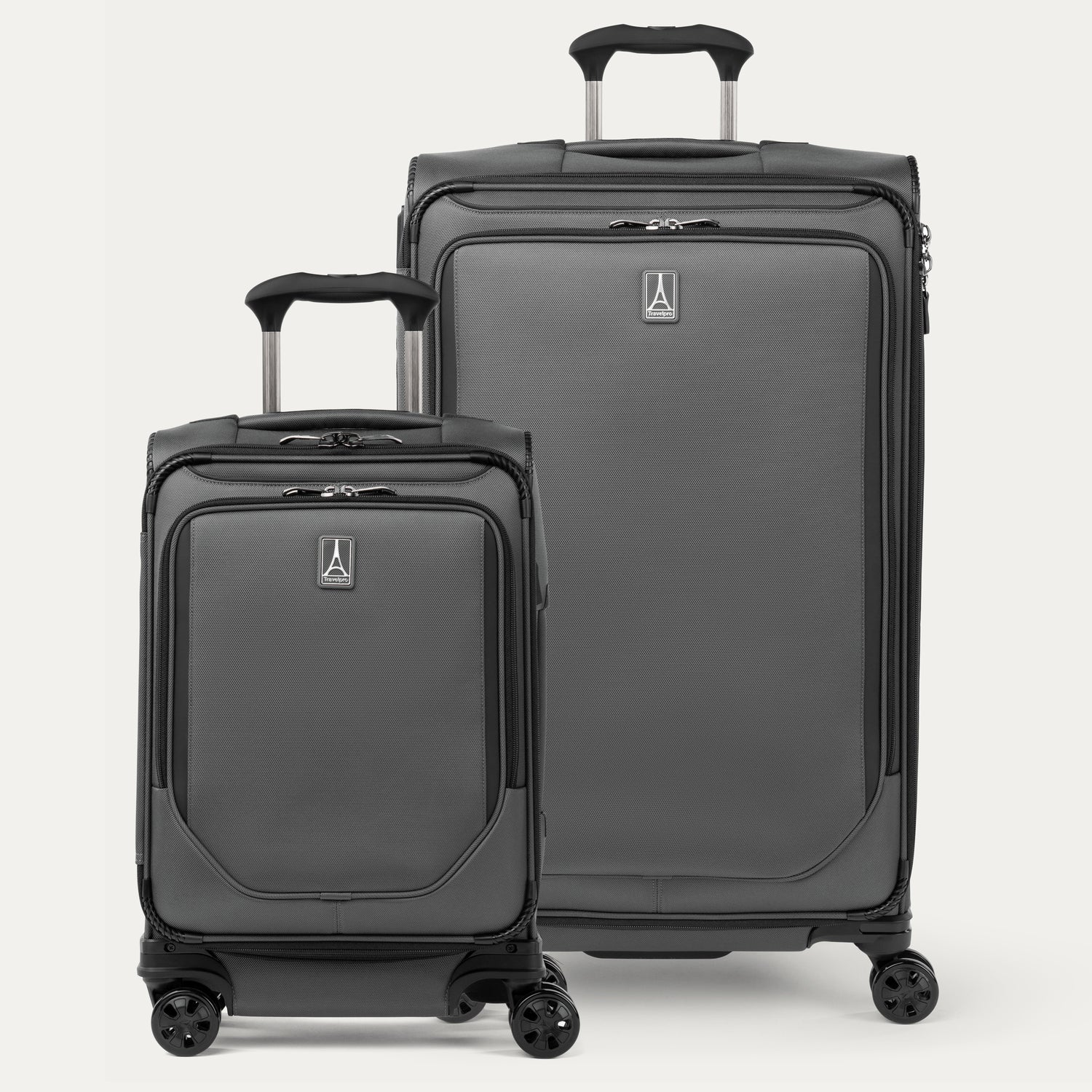 Front view of the Travelpro Crew Classic Carry-On and Checked Spinners in Titanium Grey, highlighting sleek design and dual spinner wheels.

