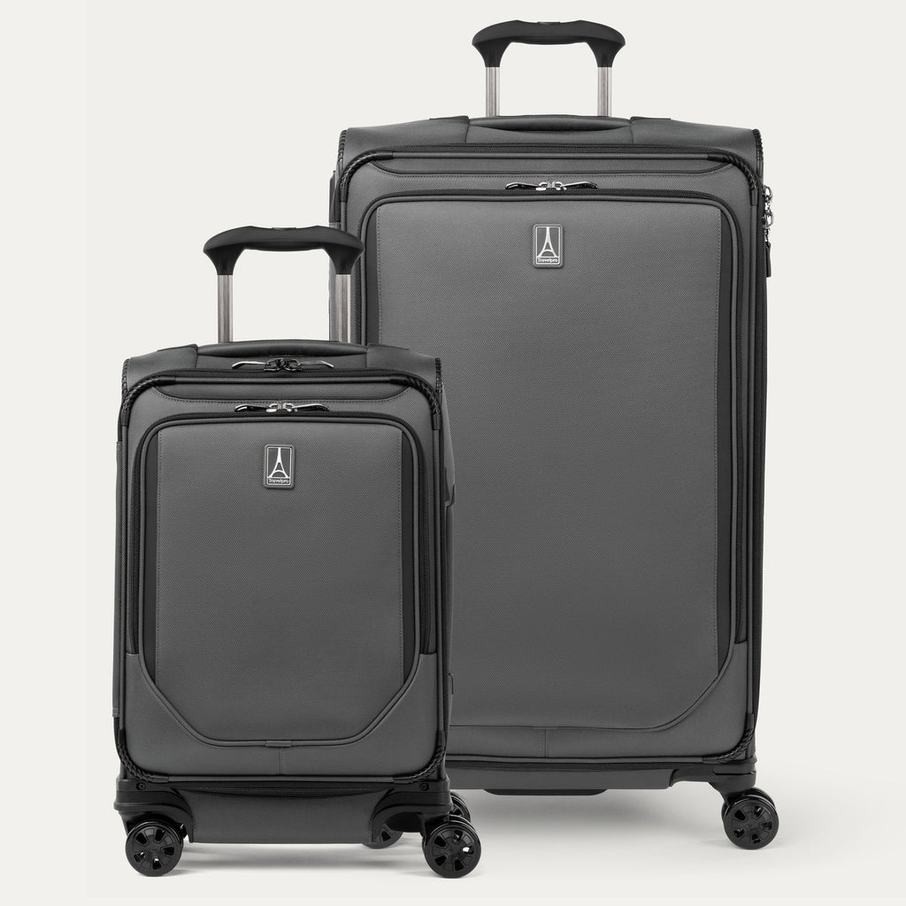 Front view of the Travelpro Crew Classic Carry-On and Checked Spinners in Titanium Grey, highlighting sleek design and dual spinner wheels.
