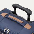 Close-up of the PowerScope Extension Handle with Contour Grip on the Travelpro Crew Classic Spinner in Patriot Blue.