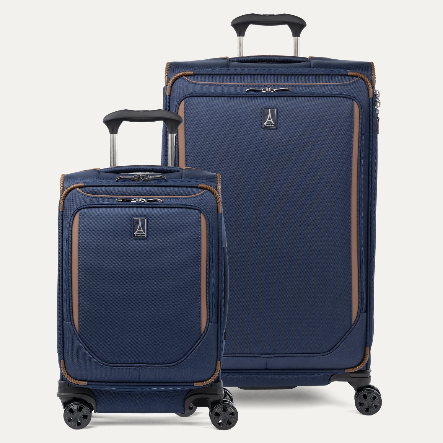 Travelpro Crew Classic Carry-On and Checked Spinners in Patriot Blue, shown with extended PowerScope handles.
