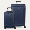 Travelpro Crew Classic Carry-On and Checked Spinners in Patriot Blue, shown with extended PowerScope handles.
