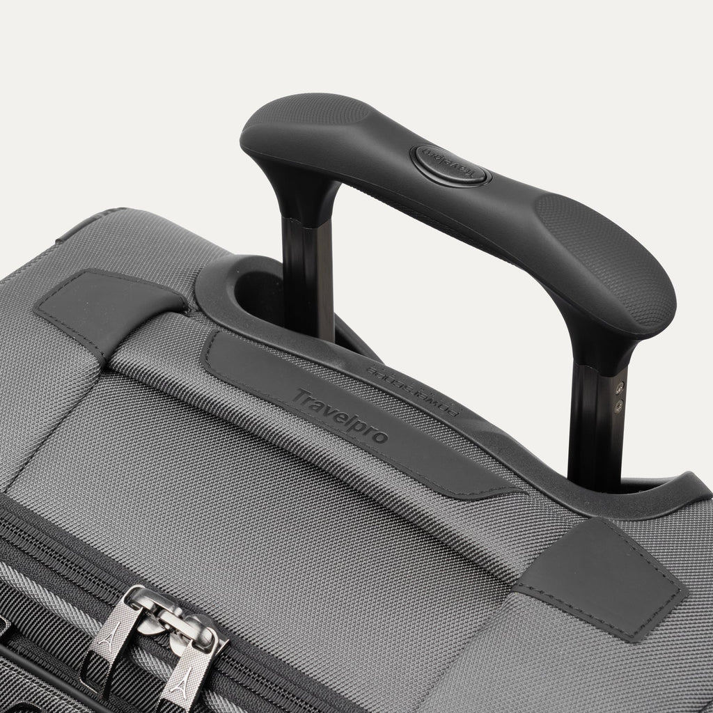 Close-up of a gray suitcase handle 