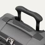 Close-up of a gray suitcase handle 