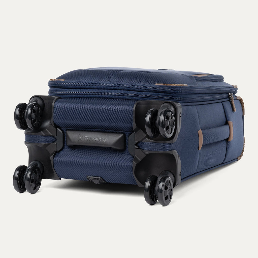 Blue suitcase with black wheels on a white background