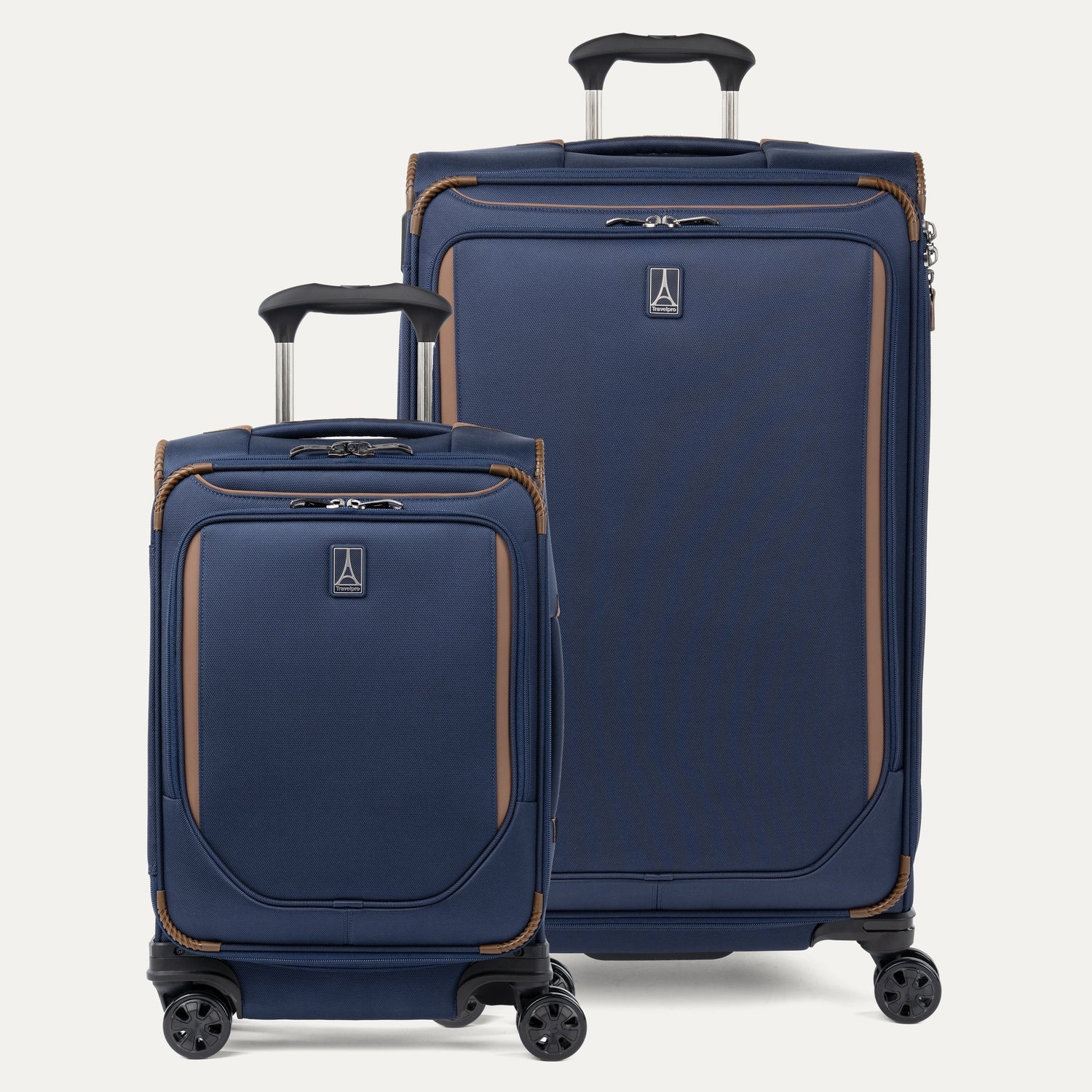 A set of two blue spinner suitcases, one carry-on size and one check-in size, with brown accents on a white background 