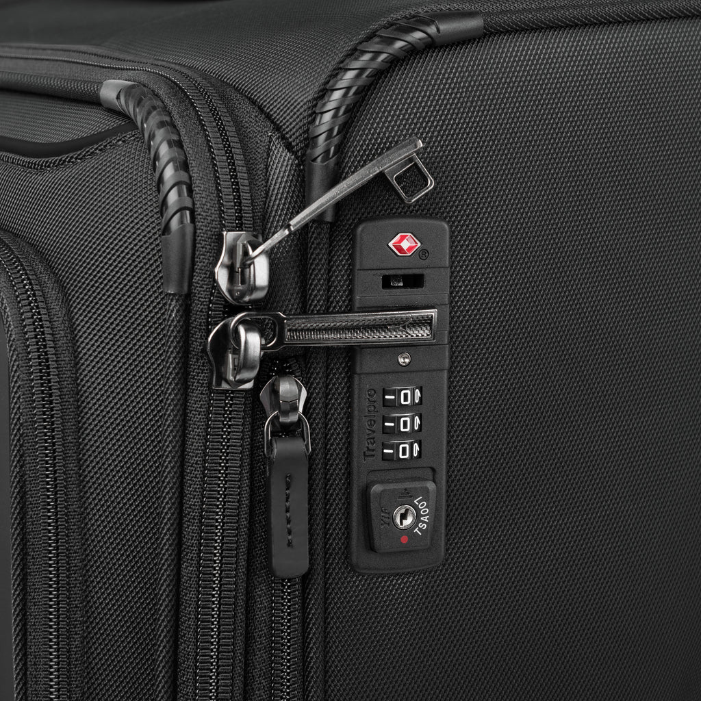 Close-up of a black suitcase with a combination lock on a white background