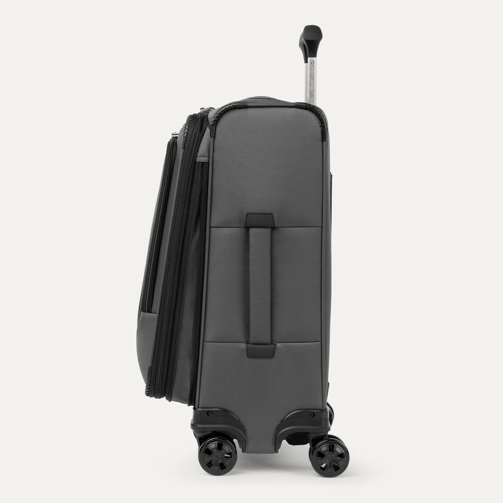 Grey suitcase with wheels and handle  on a white background
