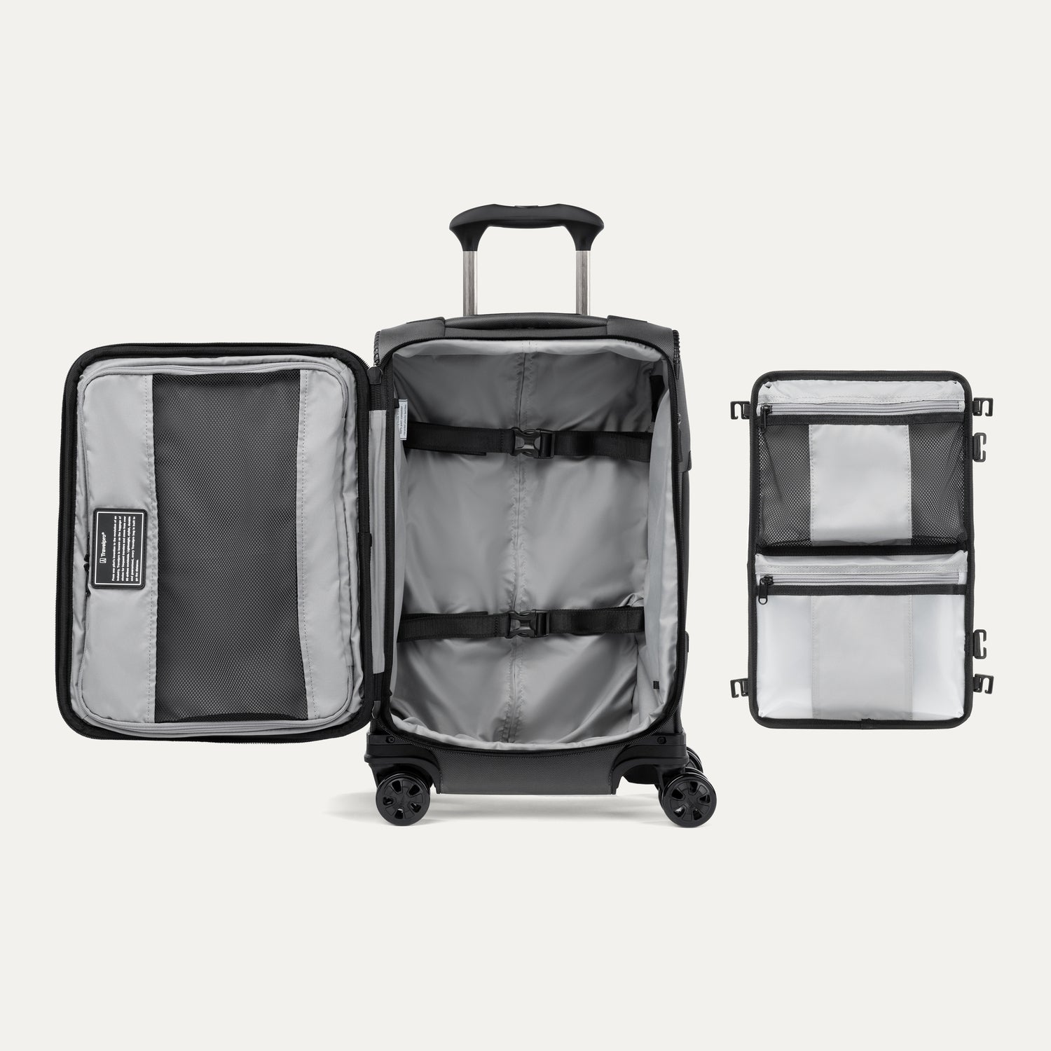 Open black suitcase featuring packing organizer on a white background.