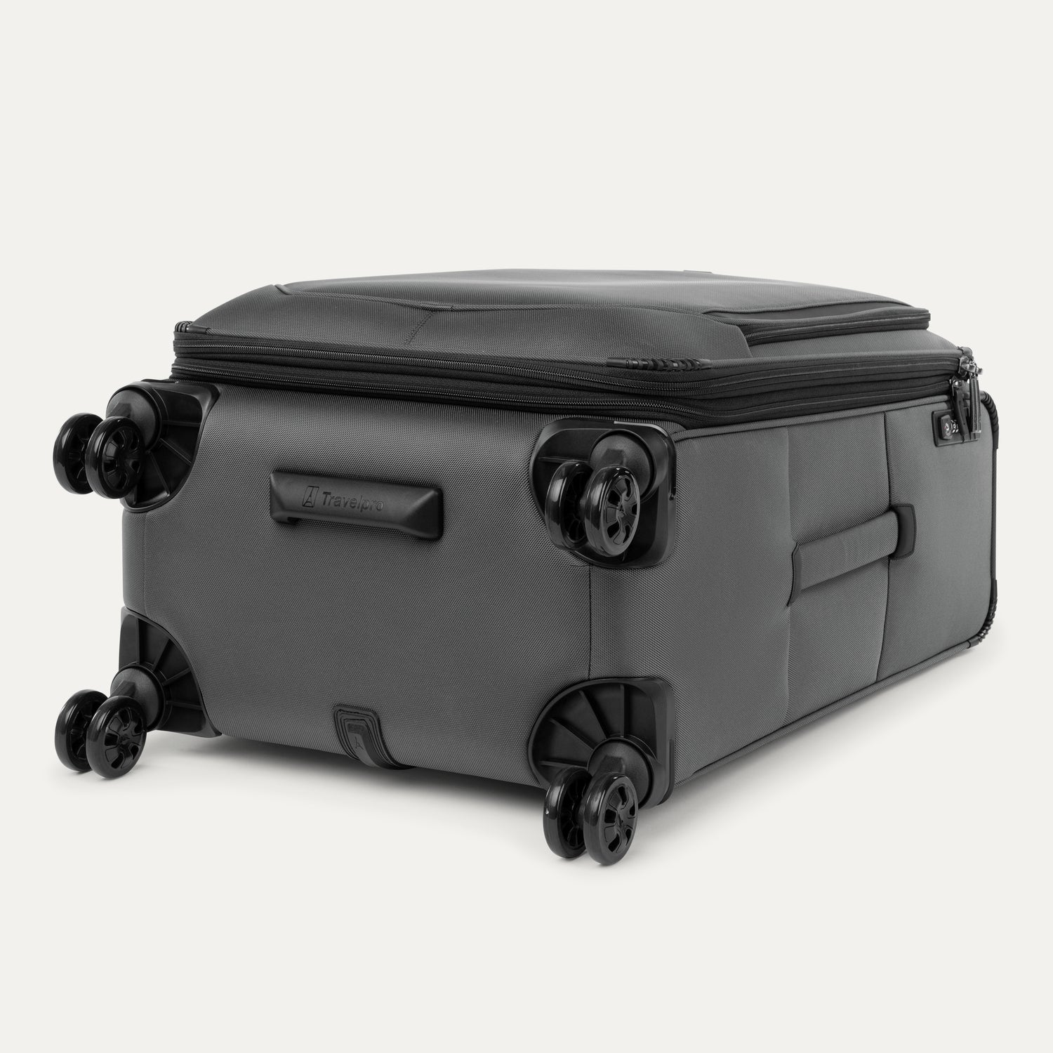 Grey suitcase with black wheels on a white background