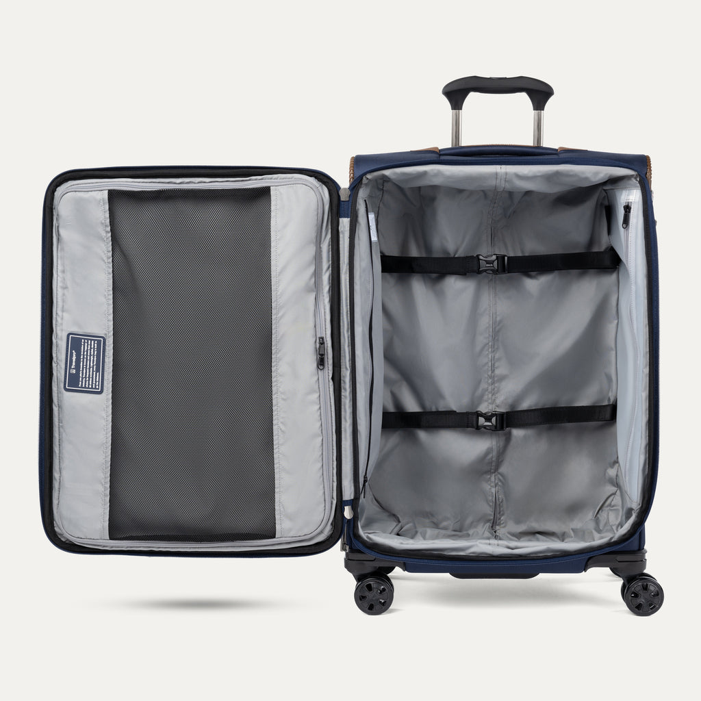 Open suitcase showing interior view on a white background 