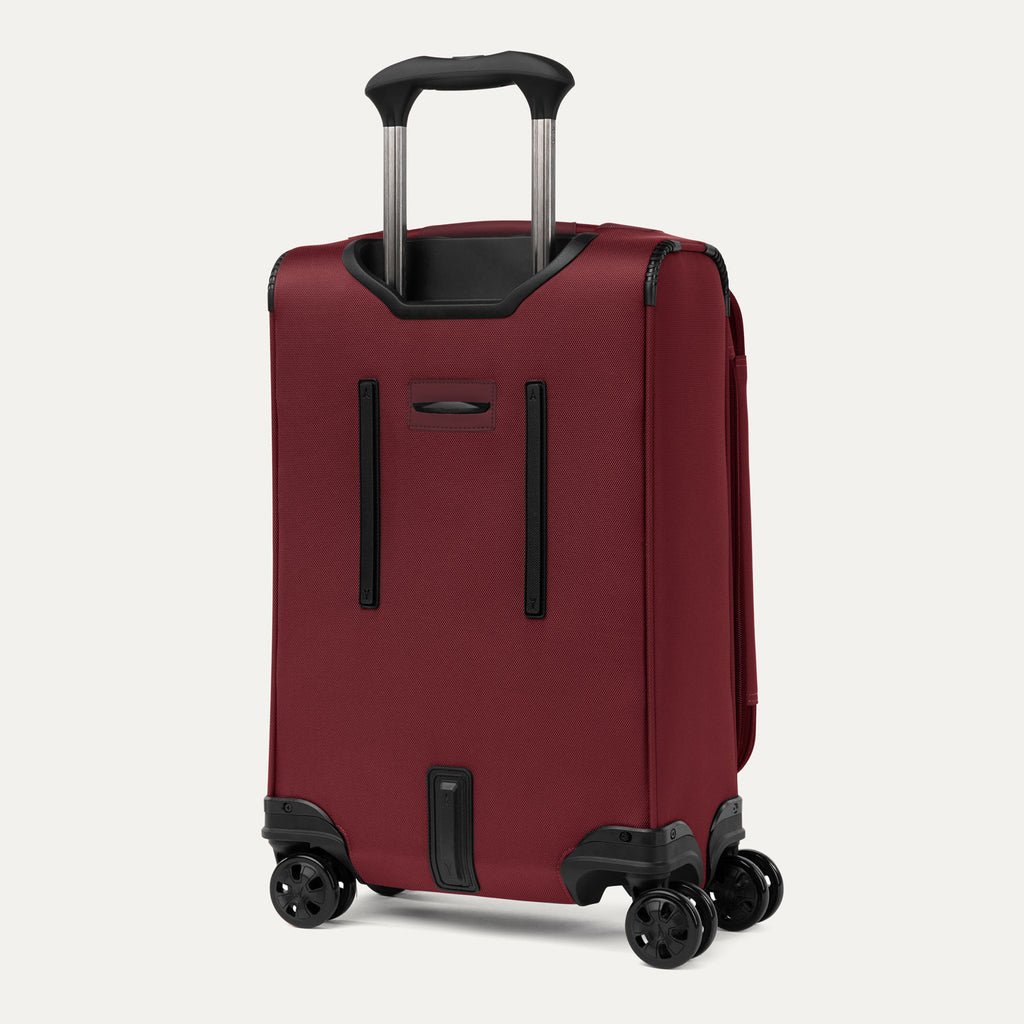 Crew™ Classic Carry-on Expandable Spinner in Rosewood Red with visible handle and wheels.
