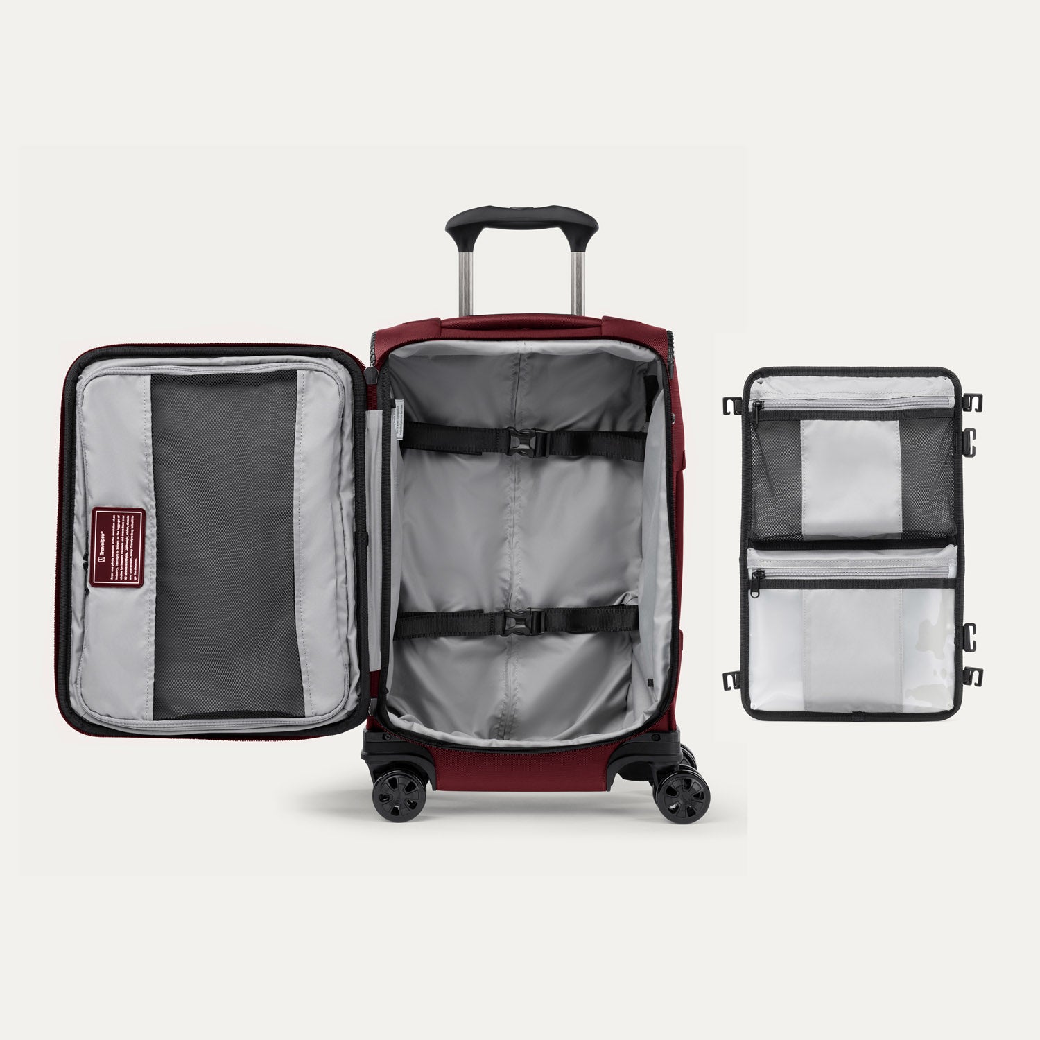 Open view of Crew™ Classic Carry-on Expandable Spinner in Rosewood Red, showing interior compartments and removable accessory panel.
