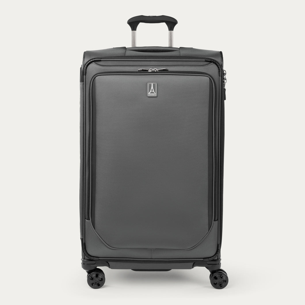 Front view of Travelpro Crew Classic Large Check-In Expandable Spinner in Titanium Grey, with 360° Spinner Wheels, corner reinforcements, and low-profile top carry handle.