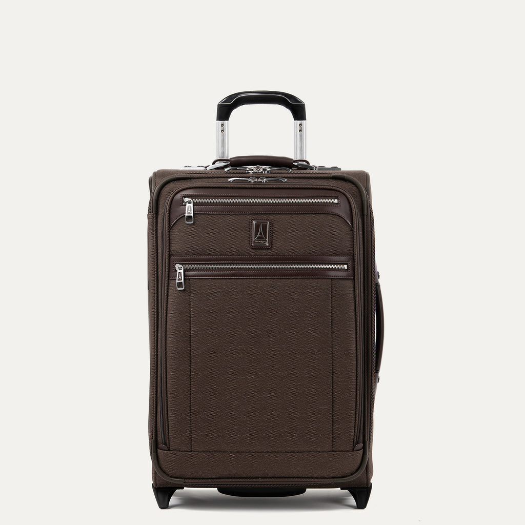 Front view of Travelpro Platinum Elite Carry-On Rollaboard in Rich Espresso, showing dual zippered front pockets, leather trim, side carry handle, and telescoping handle.