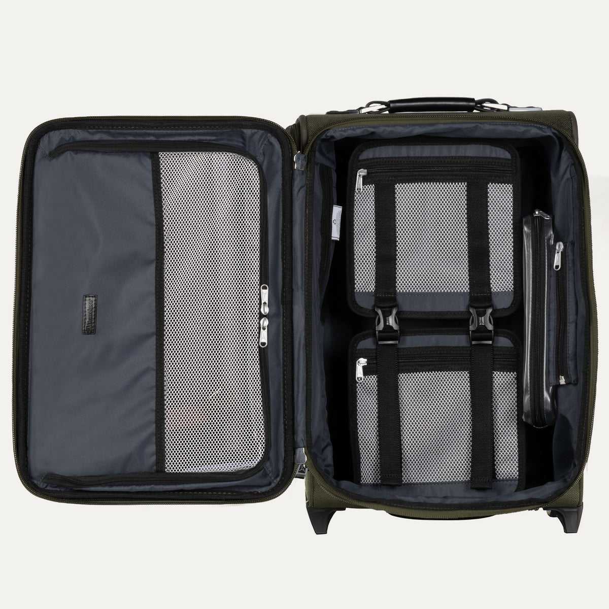 Interior of a rollaboard suitcase with packing accessories