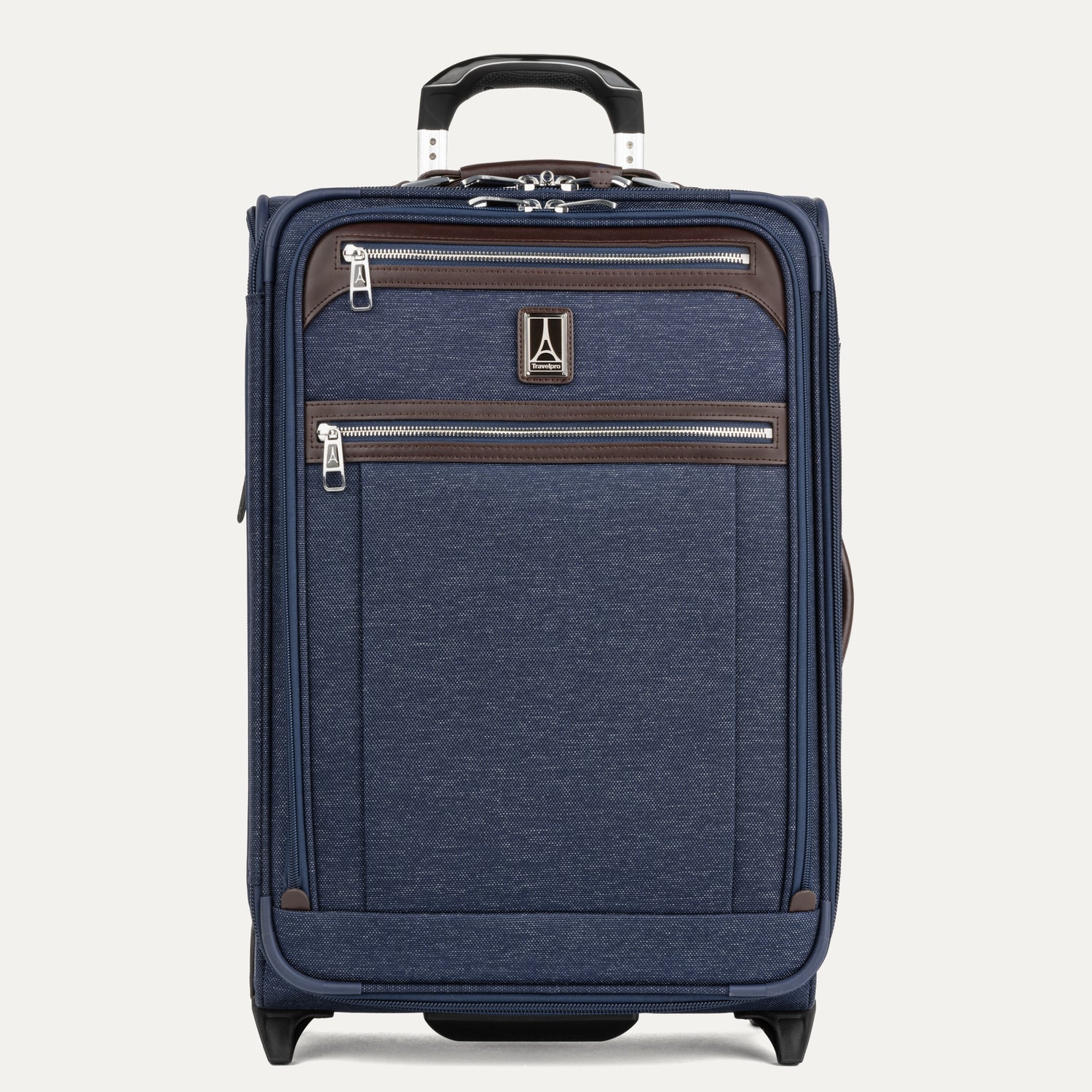 Front view of Travelpro Platinum Elite Carry-On Rollaboard in True Navy, featuring dual front zip pockets, leather accent trim, side carry handle, and telescoping handle.
