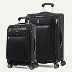 A set of two black Platinum Elite spinner suitcases, one carry-on size and one medium check-in size, with chrome zippers and TSA locks.