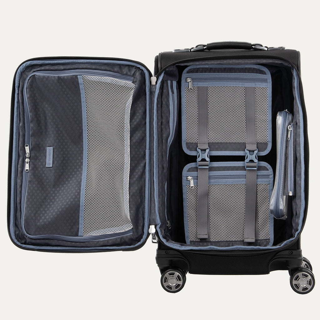 Open suitcase with interior organization panels on a white background