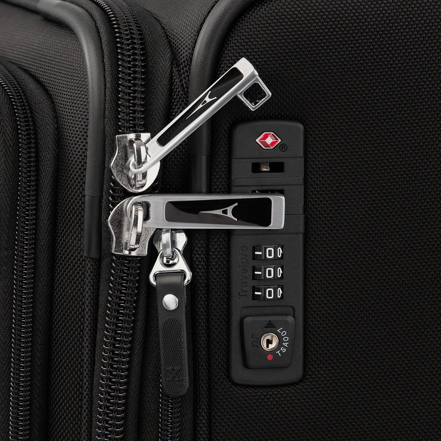 Close-up of a suitcase's zipper and lock mechanism.