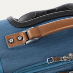 Close-up of a blue suitcase handle and latch.