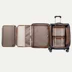 Open suitcase with open suiter compartment on a white background