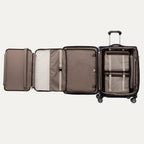 Open suitcase with open suiter compartment on a white background