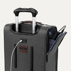 Close-up of a gray suitcase with handle and USB cable on a white background 