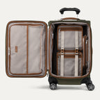 Open green suitcase on a white background