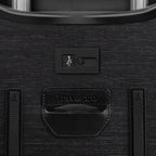 Close-up of a black suitcase with USB port and Travelpro branding.