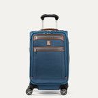 Front view of Travelpro Platinum Elite Carry-On Spinner in Coastal Blue, with dual front zippered pockets, leather trim, spinner wheels, and telescoping handle.