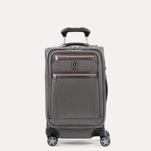 Front view of Travelpro Platinum Elite Carry-On Spinner in Vintage Gray, with contrast trim, dual zippered pockets, spinner wheels, and telescoping handle.