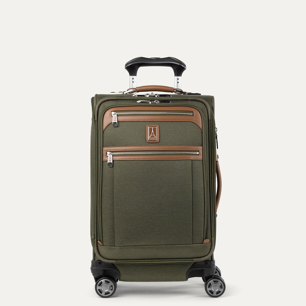 Front view of Travelpro Platinum Elite Carry-On Spinner in Olive Green with contrast trim, dual zippered pockets, spinner wheels, and telescoping handle.