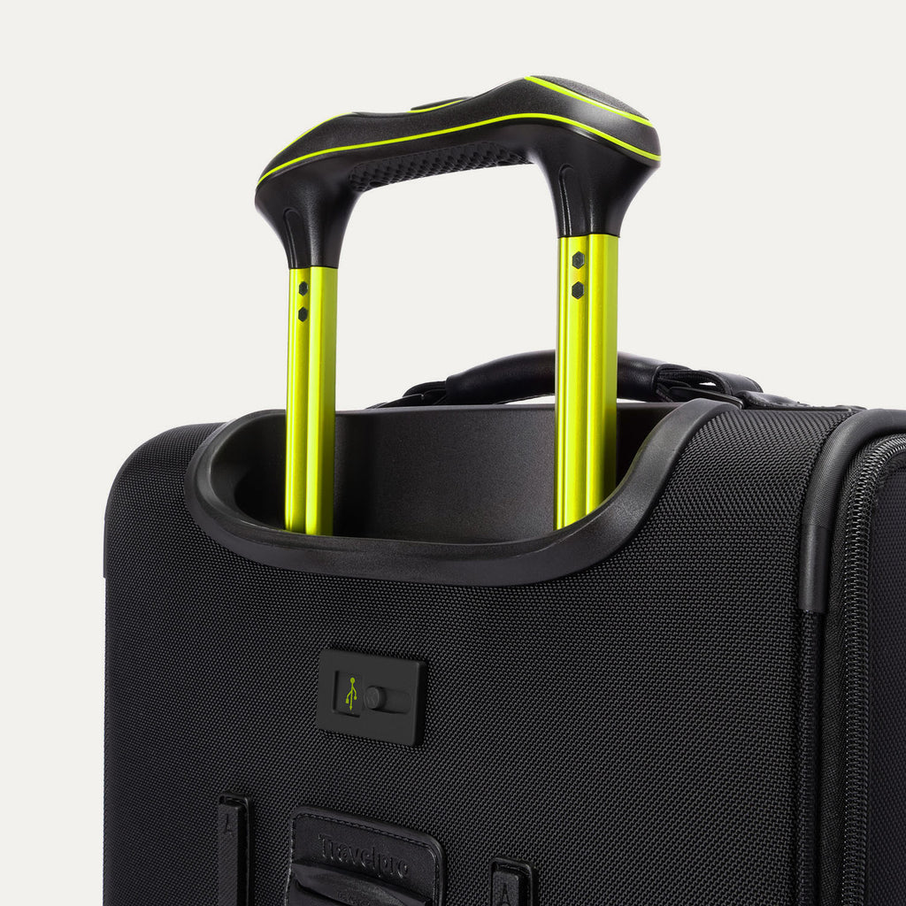 Detailed close-up of the extended trolley handle on the Platinum Elite Neon Shadow Carry-On in black, highlighting the sturdy, ergonomic handle design with signature neon green accenting.