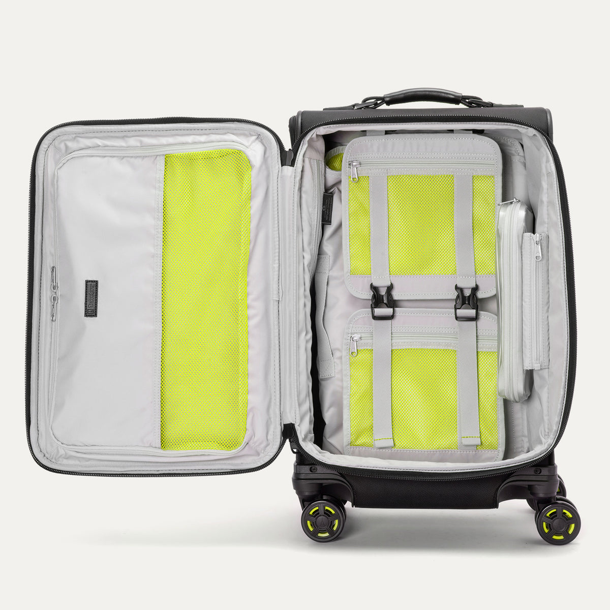 Interior view of the Platinum Elite Neon Shadow Carry-On in black, featuring zippered mesh compartments and adjustable compression straps with signature neon green accents for organized, efficient packing.