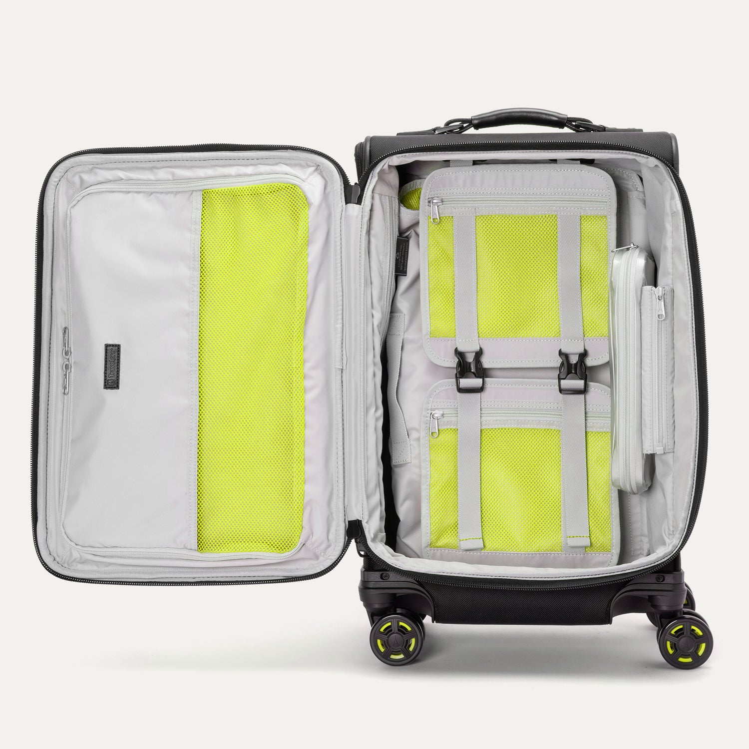 Interior view of the Platinum Elite Neon Shadow Carry-On in black, featuring zippered mesh compartments and adjustable compression straps with signature neon green accents for organized, efficient packing.