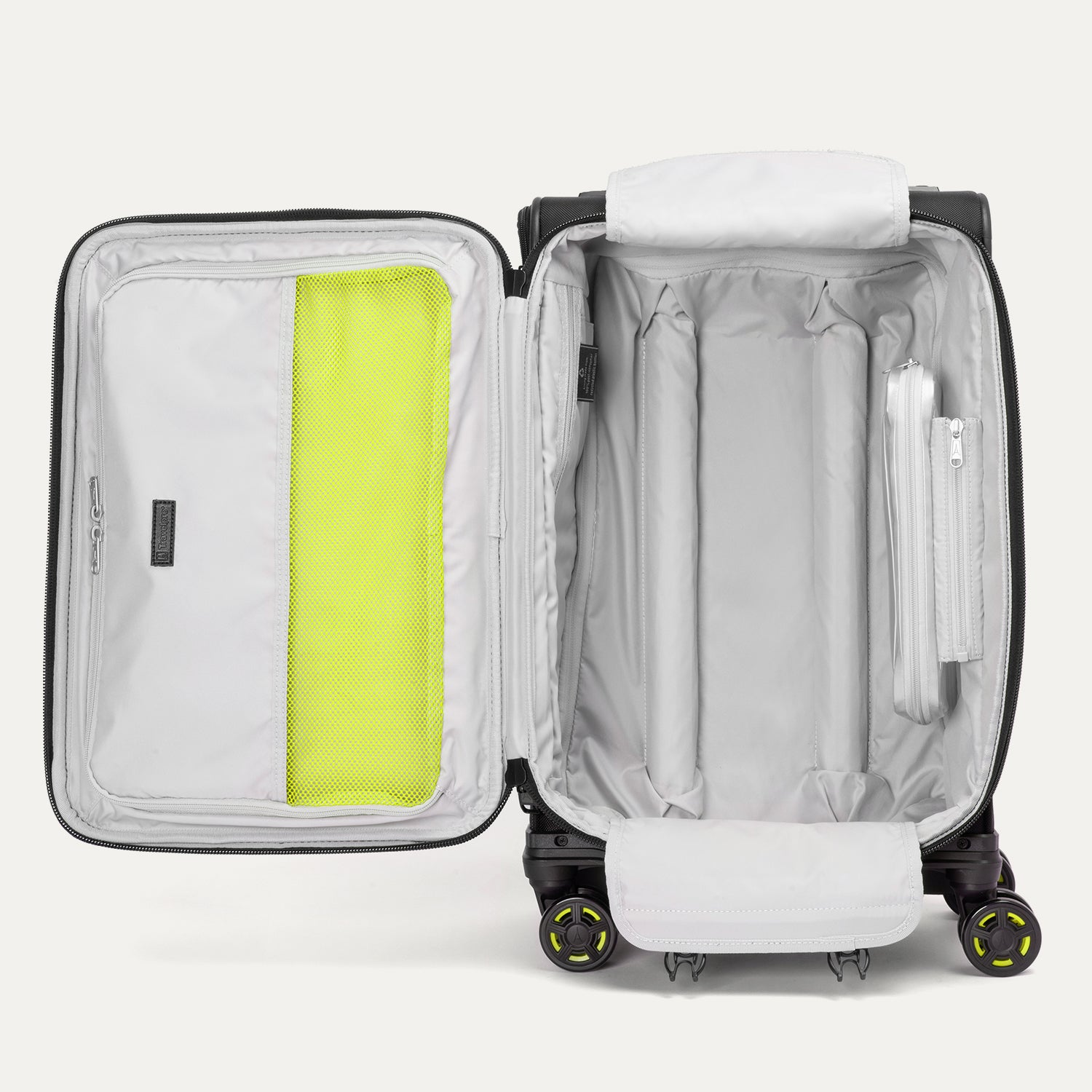 Detailed interior view of the Platinum Elite Neon Shadow Carry-On in black, highlighting the spacious main compartment with zippered mesh pockets and signature neon green compression straps for secure and organized packing.