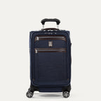 Front view of Travelpro Platinum Elite International Carry-On Spinner in True Navy, with leather-accented zippered pockets and PowerScope Extension Handle.
