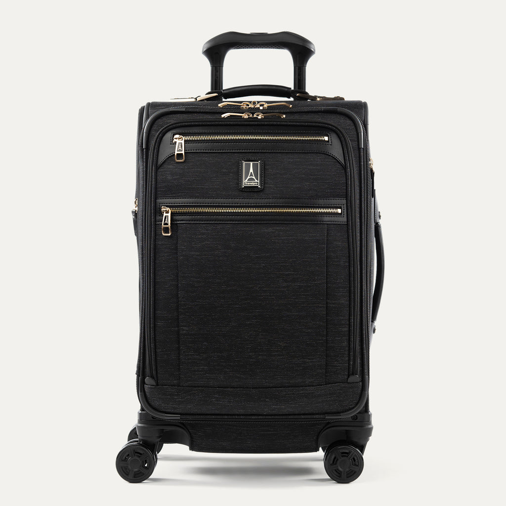 Front view of Travelpro Platinum Elite Carry-On Spinner in Intrigue Black, with two front zippered compartments and a telescoping PowerScope Extension Handle.
