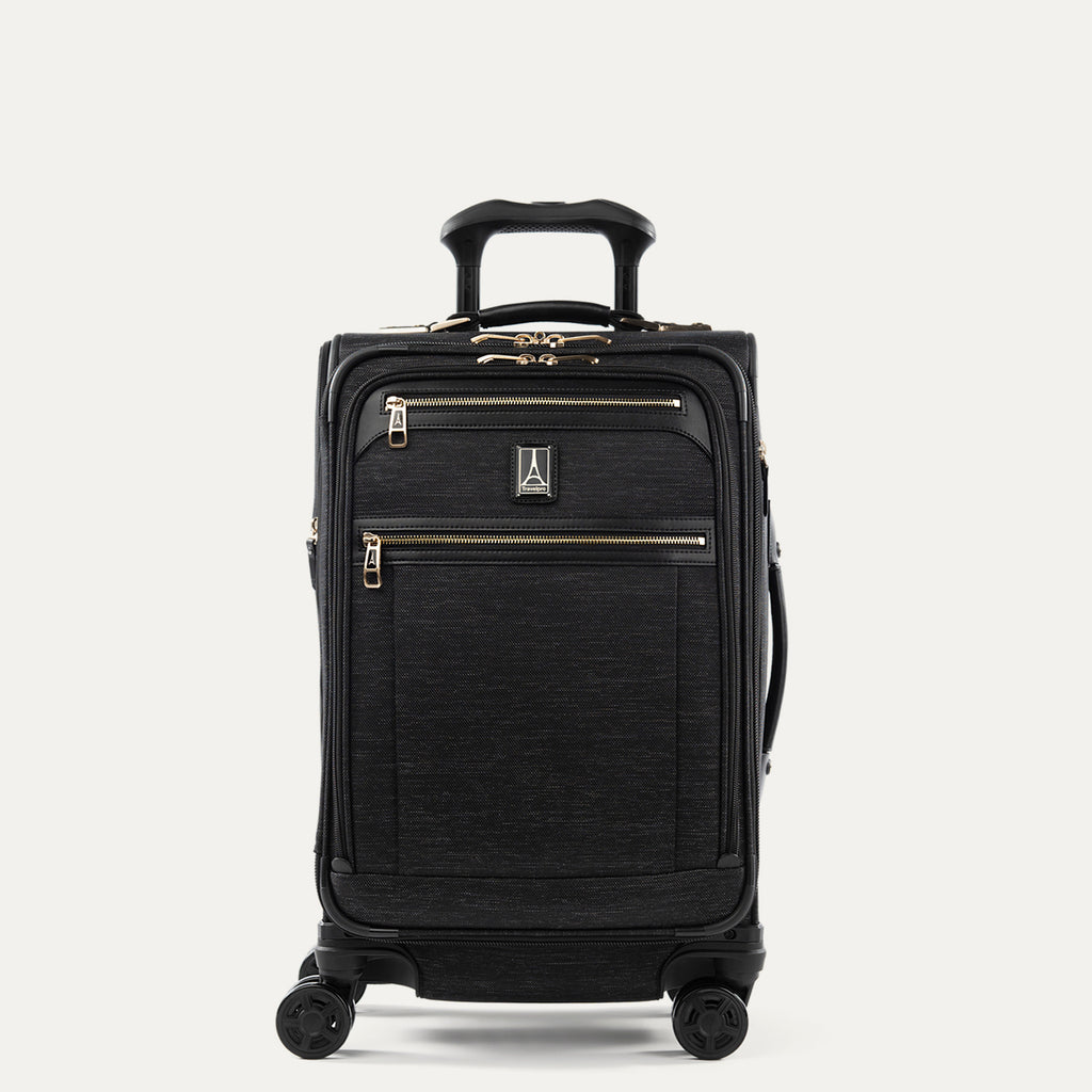 Front view of Travelpro Platinum Elite Carry-On Spinner in Intrigue Black, with two front zippered compartments and a telescoping PowerScope Extension Handle.