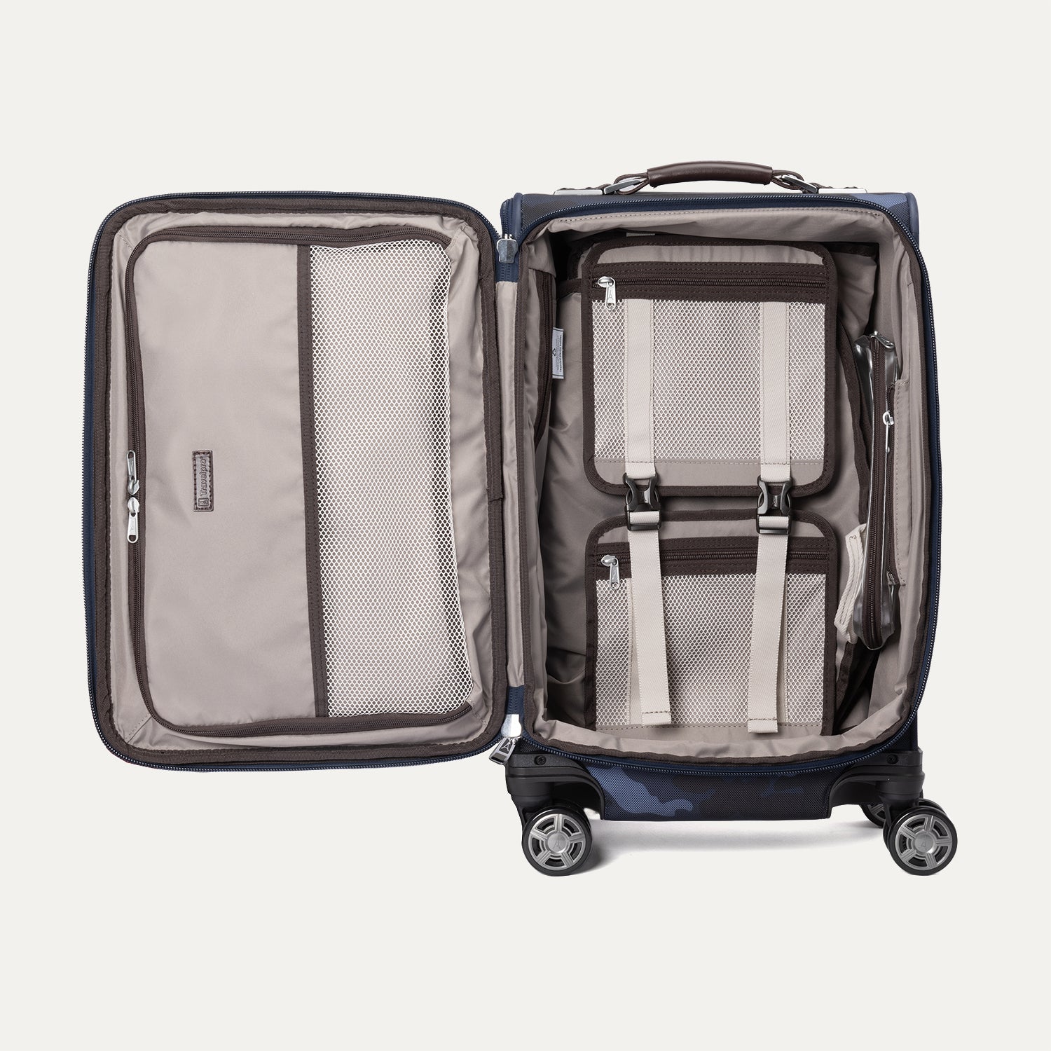  Open view of Platinum® Elite Carry-On Spinner in Camouflage, showing interior with mesh compartments, and adjustable straps.