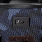  Close-up of Platinum® Elite Carry-On Spinner in Camouflage, featuring a built-in USB port 