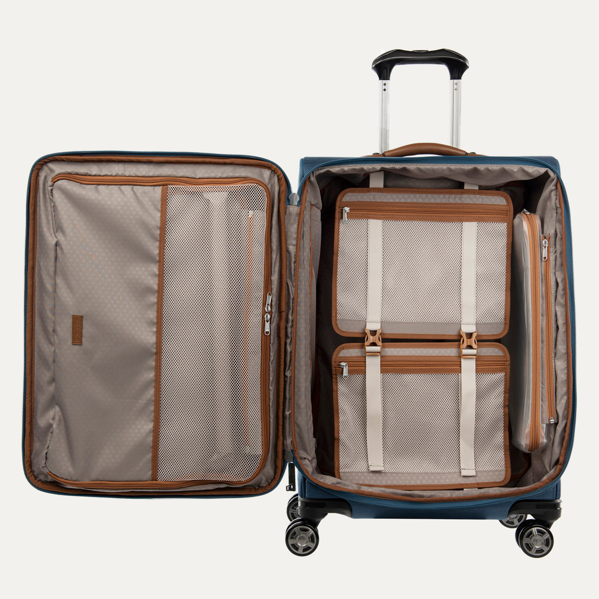 Interior view of the Travelpro Platinum Elite Medium Check-In Spinner in Coastal Blue, showcasing the fully open main compartment with zippered mesh dividers and compression packing system.