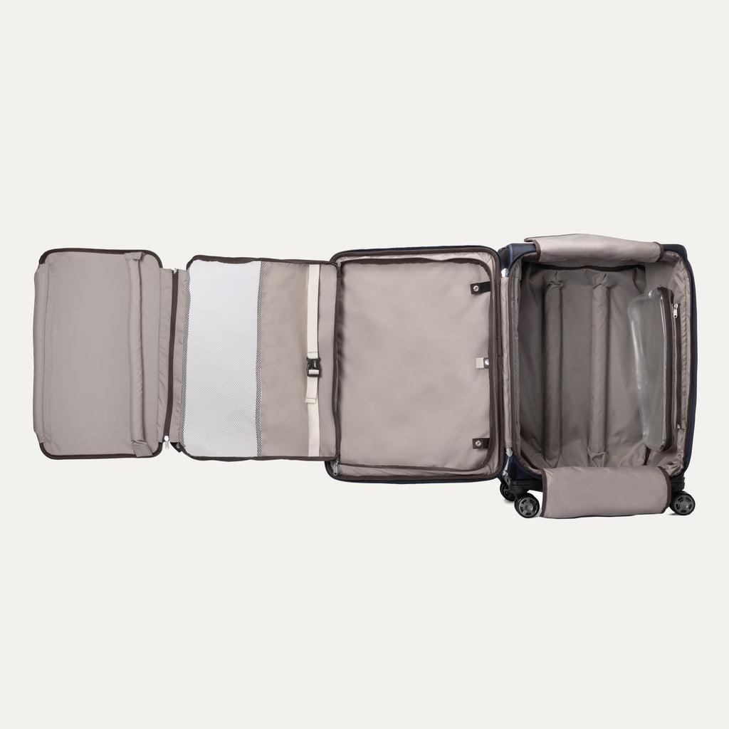 Open Platinum® Elite Medium Check-In Spinner in Camouflage, featuring organized packing sections with a fold-out suiter and a clear zippered pouch.