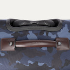  Close-up of top handle and PowerScope extension handle on Platinum® Elite Medium Check-In Spinner in Camouflage.